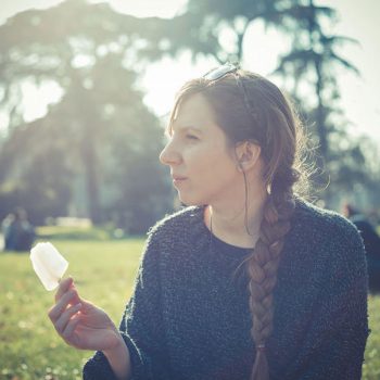 young beautiful blonde hipster woman outdoors