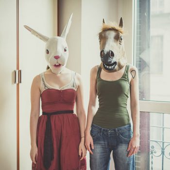 mask rabbit and horse mask lesbian couple at home