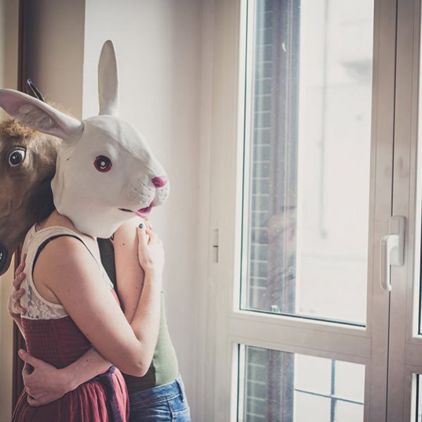 mask rabbit and horse mask lesbian couple at home
